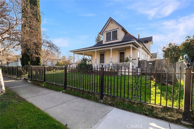 view of front facade with a porch and a front yard