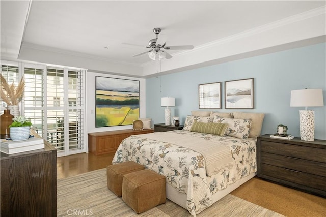 bedroom with ornamental molding, access to outside, ceiling fan, and light hardwood / wood-style flooring