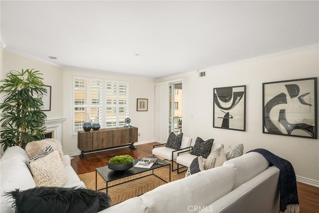 living room featuring ornamental molding and dark hardwood / wood-style flooring