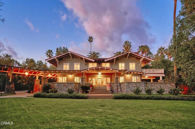 view of front of house with a lawn