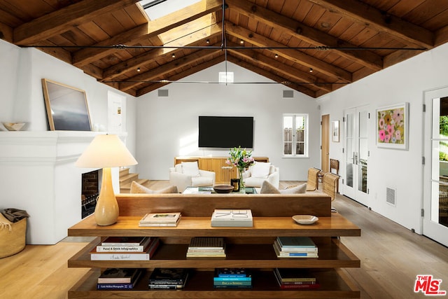 living room with wood-type flooring, vaulted ceiling with beams, and wooden ceiling