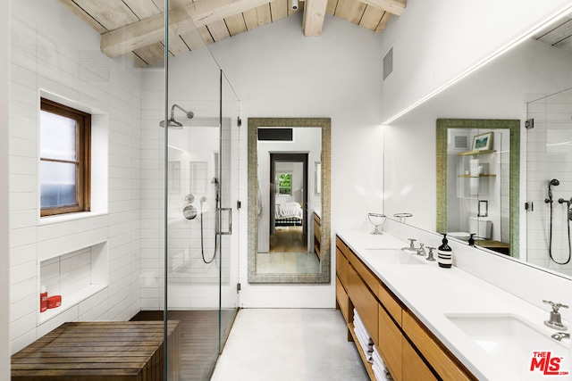 bathroom with vanity, plenty of natural light, vaulted ceiling with beams, and wood ceiling