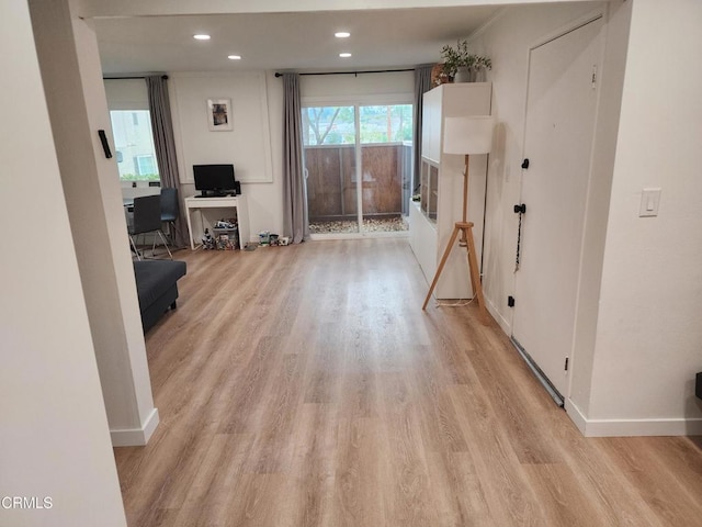 living room with light hardwood / wood-style flooring