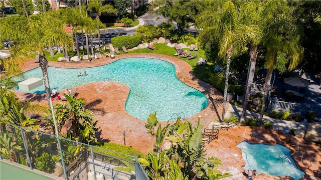 view of swimming pool featuring a patio area