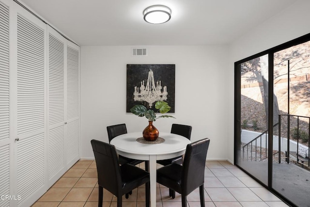 dining room featuring light tile patterned flooring