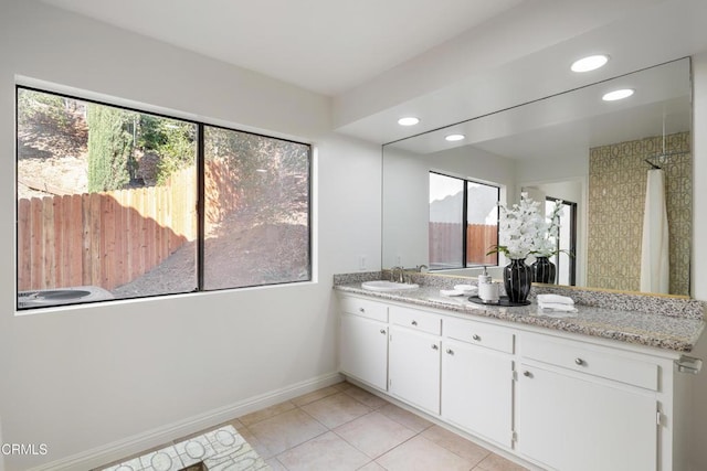 bathroom with vanity and tile patterned floors