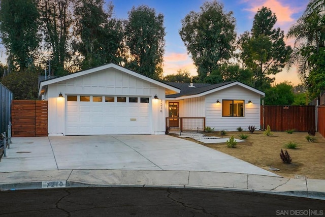 ranch-style house featuring a garage