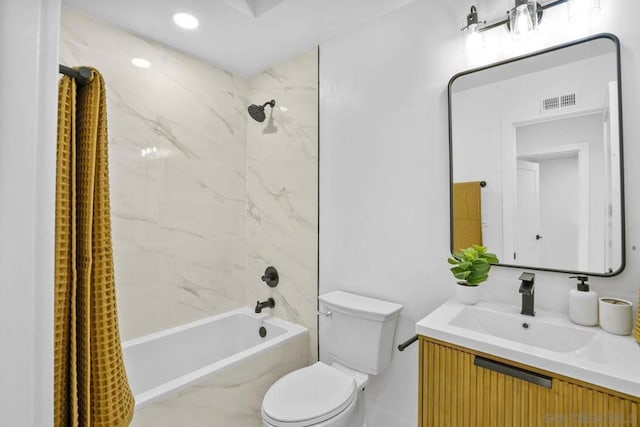 full bathroom featuring shower / tub combo with curtain, vanity, and toilet