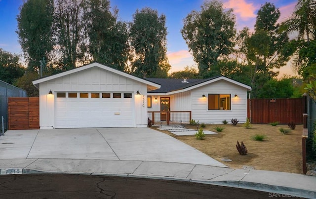 ranch-style home featuring a garage