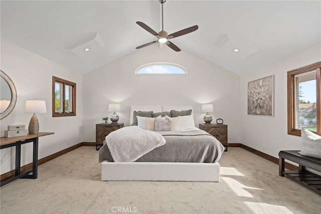 bedroom with light carpet, vaulted ceiling, and ceiling fan