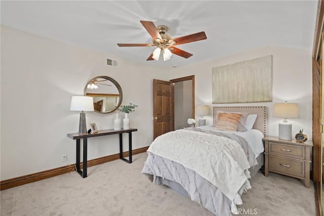 bedroom with light carpet and ceiling fan