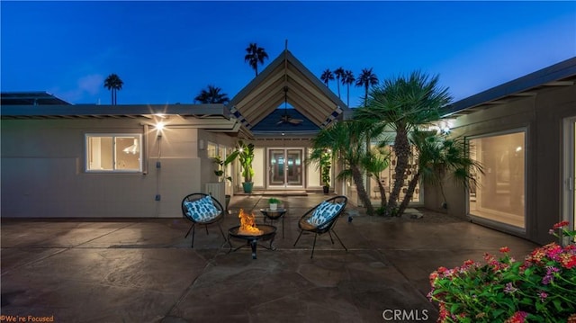 view of patio / terrace featuring a fire pit