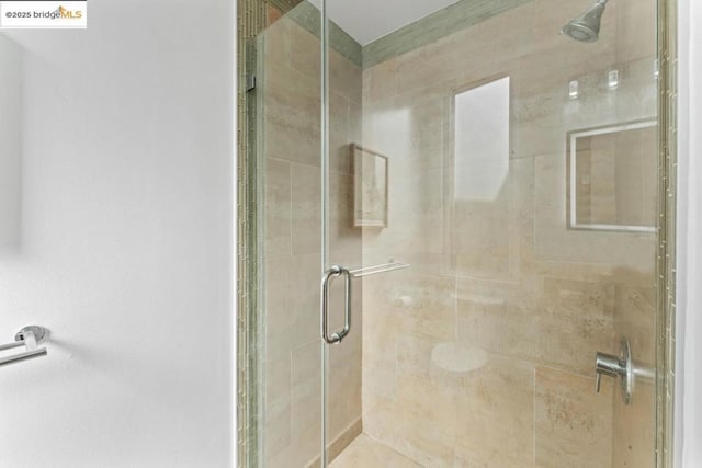 bathroom featuring walk in shower