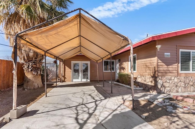 back of house featuring french doors and a patio area