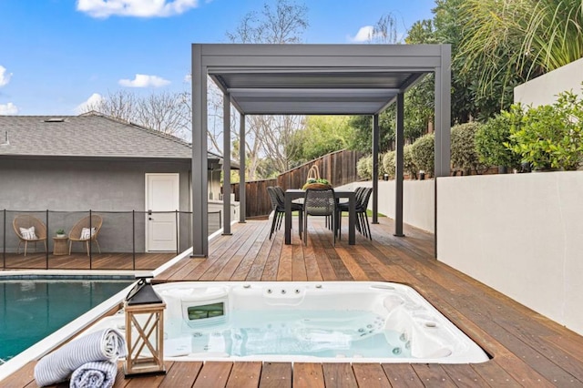 view of swimming pool featuring a wooden deck