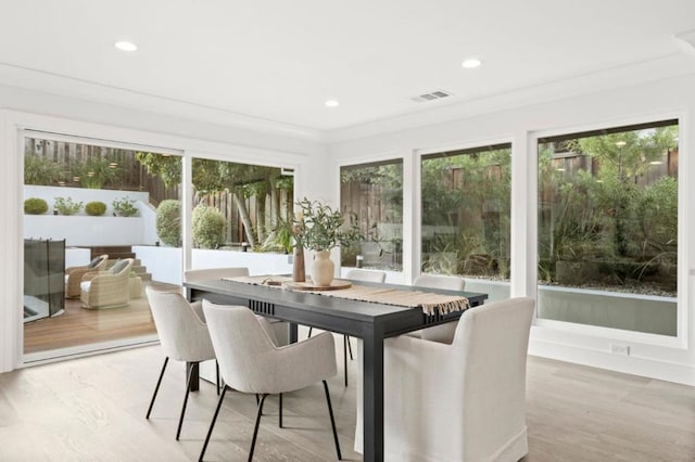 sunroom featuring a healthy amount of sunlight