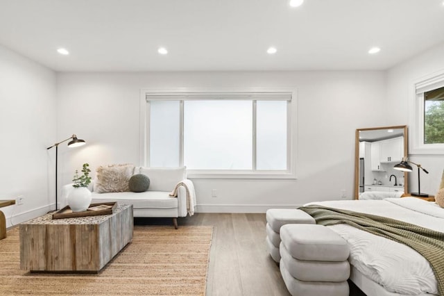 bedroom featuring light hardwood / wood-style floors