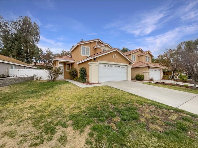 view of front of house with a garage and a front yard