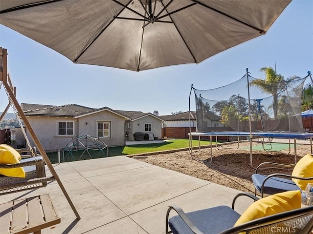 view of patio with a trampoline