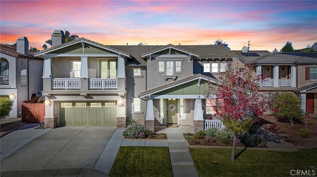 view of front of house featuring a garage and covered porch