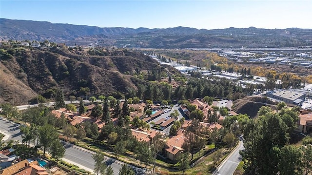 drone / aerial view featuring a mountain view