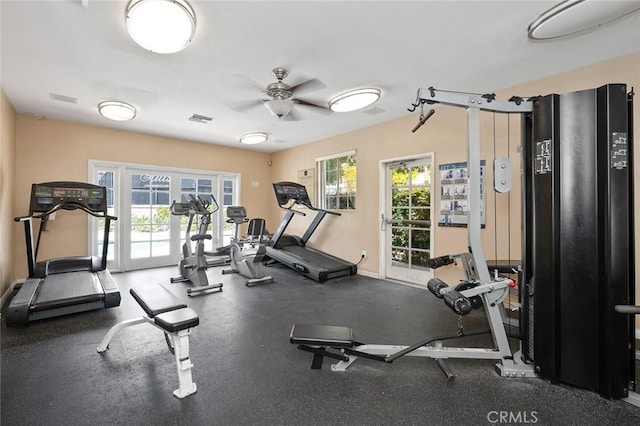 exercise room with a wealth of natural light and ceiling fan