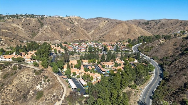 bird's eye view with a mountain view