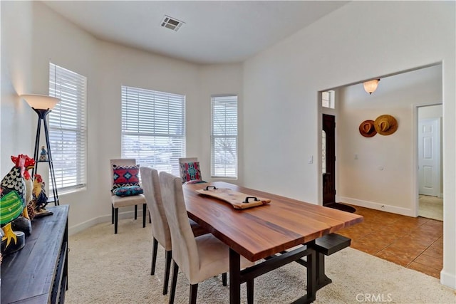 view of tiled dining space