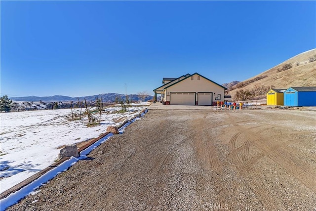 view of front of house with a mountain view