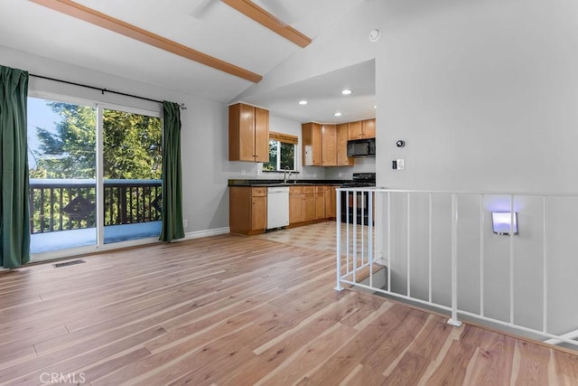 kitchen with sink, light hardwood / wood-style flooring, stove, white dishwasher, and lofted ceiling with beams