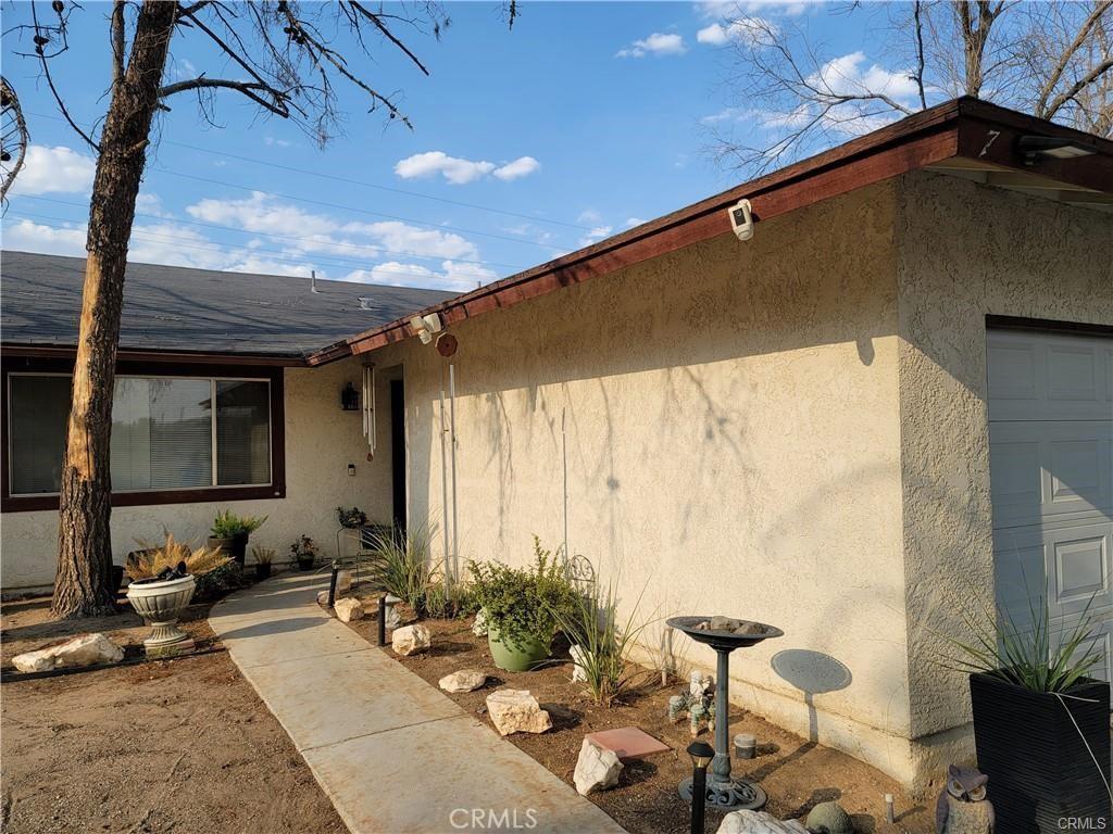 view of exterior entry featuring a garage