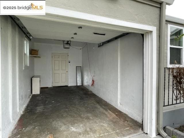 garage featuring a garage door opener