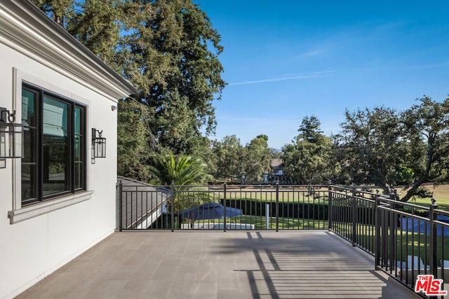 view of patio / terrace with a balcony