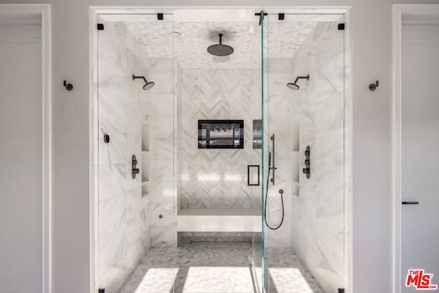 bathroom with an enclosed shower