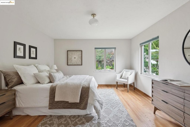 bedroom featuring light hardwood / wood-style floors