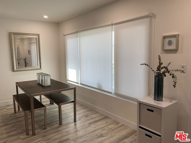 dining room with light hardwood / wood-style floors