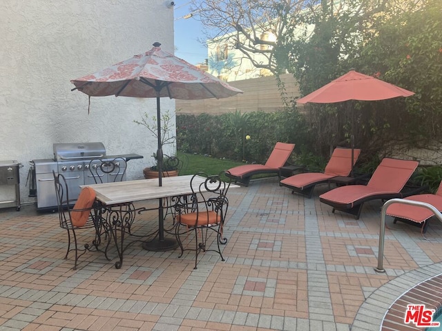 view of patio / terrace with a grill