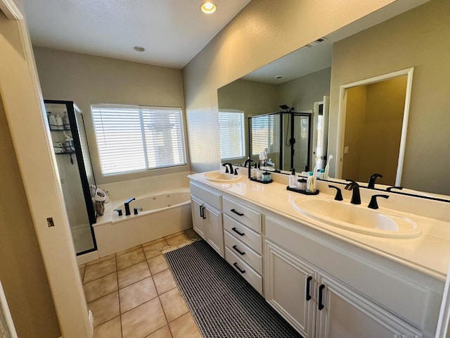 bathroom featuring vanity, tile patterned floors, and independent shower and bath