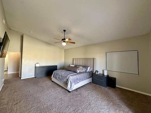 bedroom featuring ceiling fan, lofted ceiling, and carpet