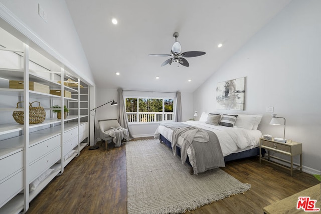 bedroom with vaulted ceiling, dark hardwood / wood-style floors, and ceiling fan