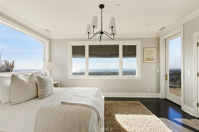 bedroom with ornamental molding, dark wood-type flooring, access to outside, and an inviting chandelier