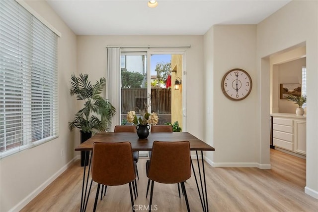 dining room featuring light wood-type flooring