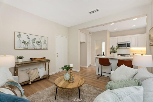 living room featuring light hardwood / wood-style floors