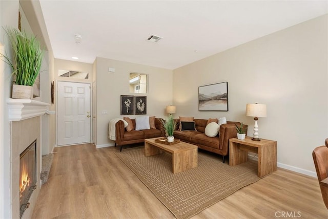 living room featuring light wood-type flooring