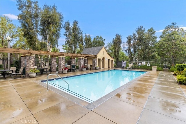 view of pool featuring a patio