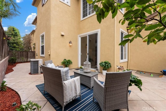 view of patio / terrace featuring central AC and an outdoor living space