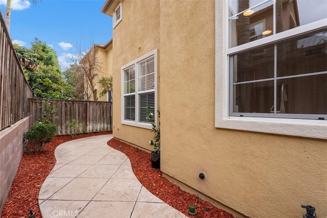 view of home's exterior with a patio