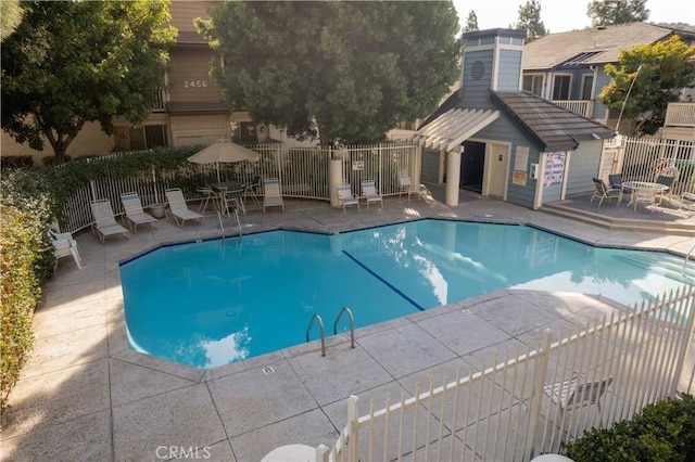 view of pool with a patio area