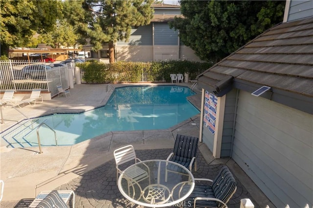 view of pool with a patio area