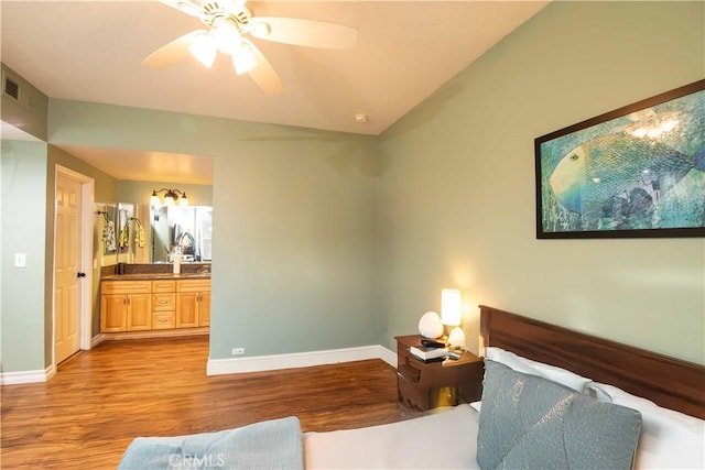 living room with ceiling fan and light wood-type flooring